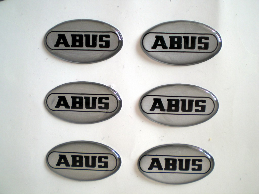 Black Print ABUS Elevator Epoxy Resin Stickers Made By Normal Silver Background